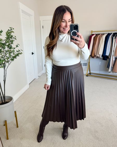 Fall work outfit with faux leather pleated skirt 

Fit tips: bodysuit tts, L // skirt tts, L 

Holiday outfit  style guide  outfits  brown skirt  brown skirt outfit  holiday outfit  holiday looks  

#LTKworkwear #LTKmidsize #LTKSeasonal