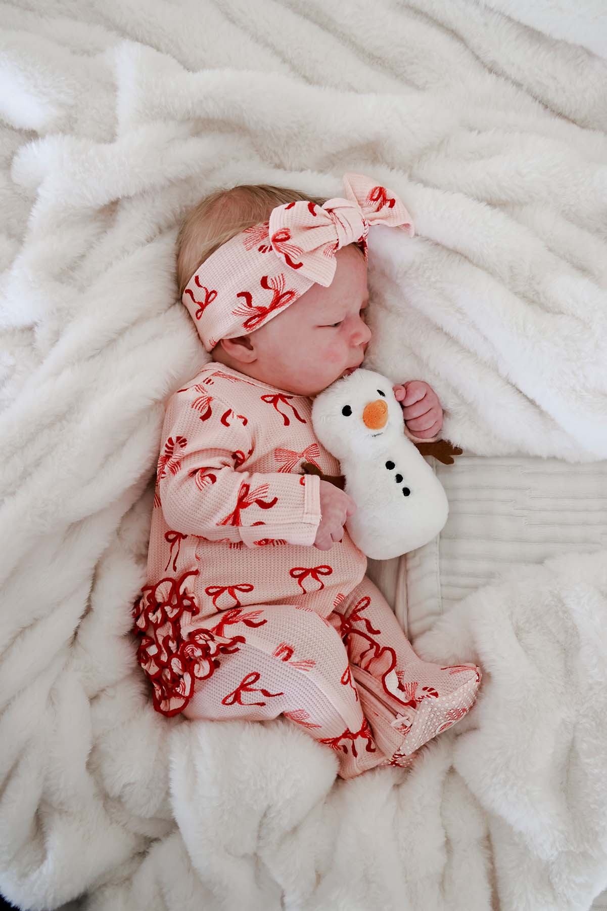Christmas Bamboo Waffle Ruffle Zipper Footie | Peppermint Bows | Caden Lane