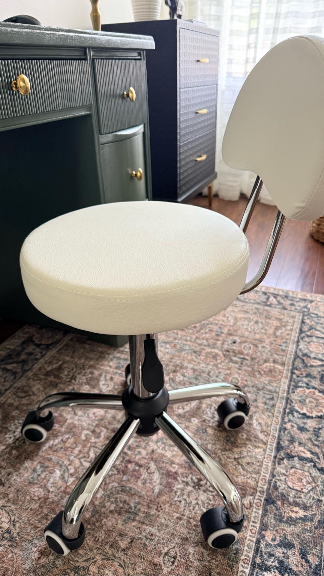 Small office chair with wheels. You can adjust the height. The color is off-white and also comes in black. It’s a nice chair for narrow spaces and if you don’t need to be sit here for too long.

#LTKHome #LTKdayinmylife #LTKWorkwear