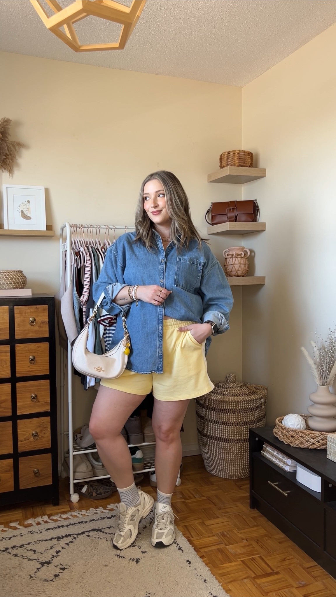 Comfy casual spring to summer outfit! Wearing my usual size L in both the denim shirt and butter yellow shorts. Canadian Old Navy links are under “similar products”. New Balance sneakers are so comfy for walking but run a little big, I’m a 9.5-10 and wear a 9.

#LTKsale #LTKmidsize #LTKsummer