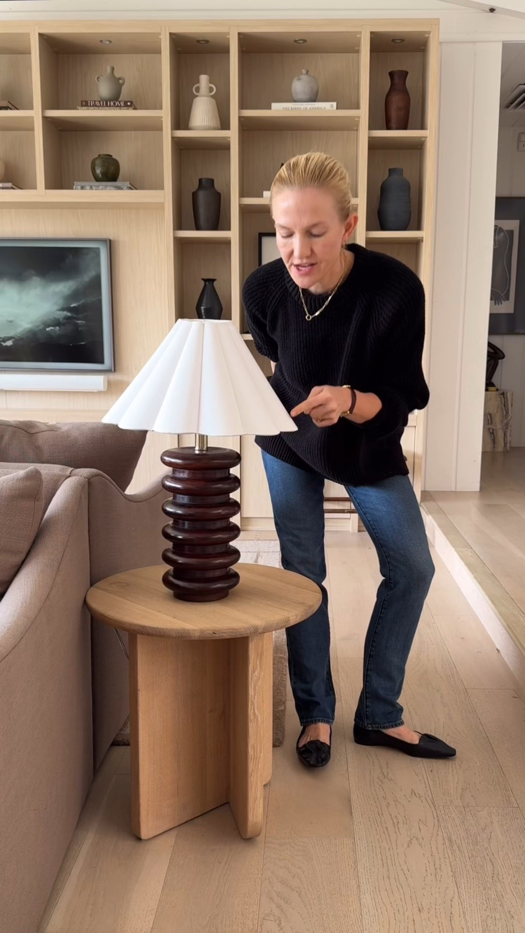 Earlier this fall when I was trying to get this spot next to our sofa figured out.

After a lot of hunting I found a lamp I loved, but the shade it came with wasn’t doing it for me.

It was a hair small (it made the lamp look like a man in a too-tight hat 🤣) and the trendy petal shape was detracting from the nifty silhouette of the base.

So I swapped it for one that was slightly bigger, with a cleaner shape and a textured linen material!

What do we think? It’s subtle but it’s a good reminder that tiny updates can have big impact! #minimalisthome #livingroom #neutralstyle

#LTKHome #LTKstorytime #LTKFindsUnder100