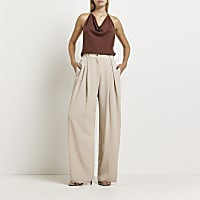 Beige wide leg pleated trousers | River Island (UK & IE)