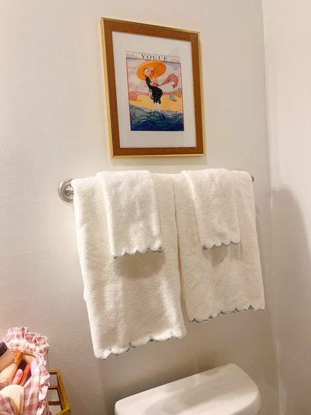 Scallop towels. Similar to weezie towels. Exact product is not linkable but is available at Homegoods (Sigrid Olson brand)