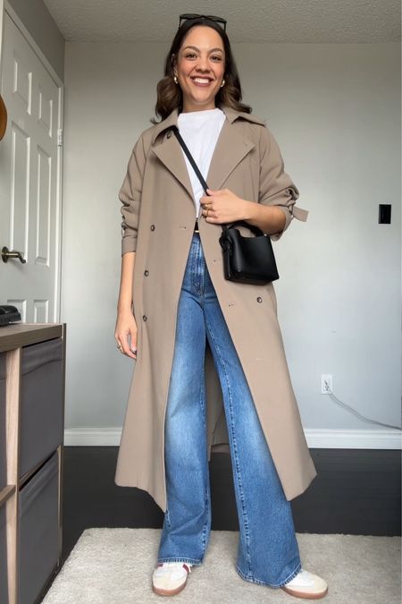 A simple spring outfit idea!
-Oak + Fort oversized trench coat in the colour brindle. I have a size medium. 
-Plain white T-shirt. Similar linked. 
-High rise wide leg medium wash jeans from Mother Denim. I have a size 28. Fit a bit big, I sized down from my usual 29. 
-Arket black mini crossbody bag. 
-Adidas samba sneakers. 
-Black rounded sunglasses. 


#LTKstyletip #LTKSeasonal #LTKfindsunder100