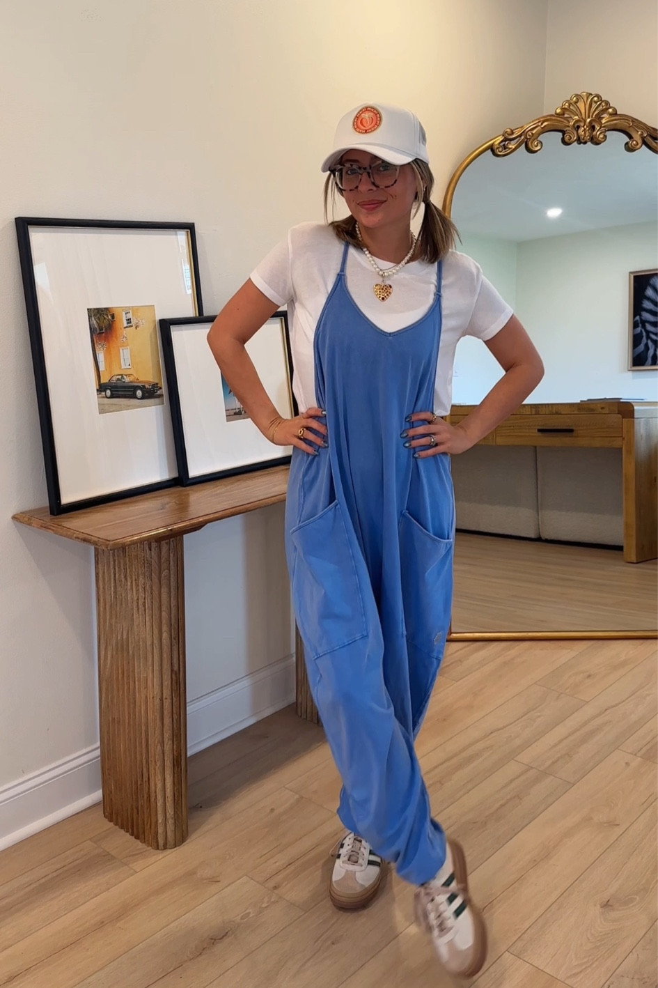 I’m wearing a size small in the tee. It’s super light weight, kind of sheer and boxy but I love it for layering or at the gym over top a sports bra! The jumpsuit is a size small :)

#LTKfindsunder50 #LTKfindsunder100 #LTKstyletip