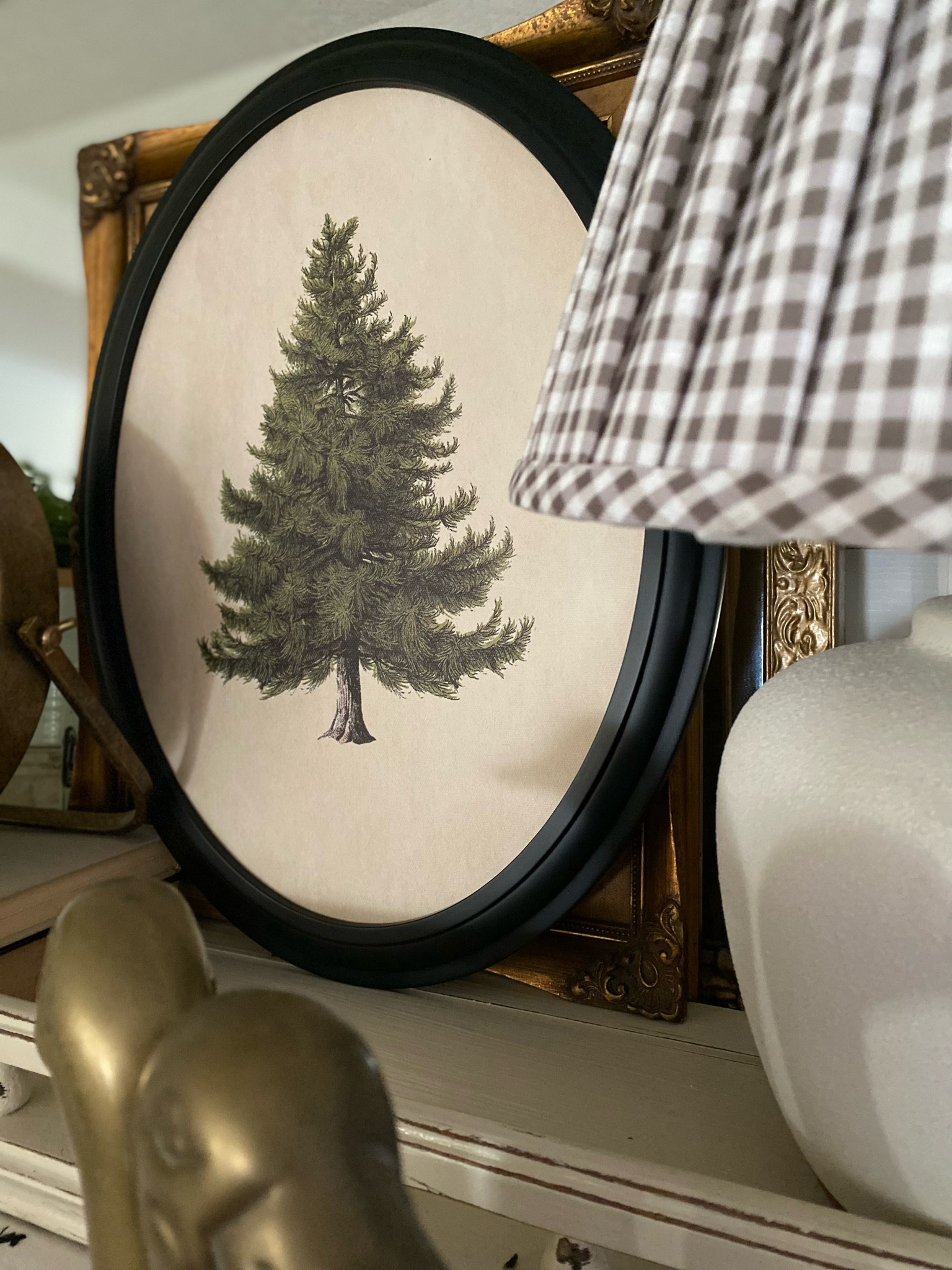 Threshold Studio McGee 
Evergreen Art
Oval Black Frame
Gingham print lamp shade

#LTKhome #LTKHoliday #LTKstyletip