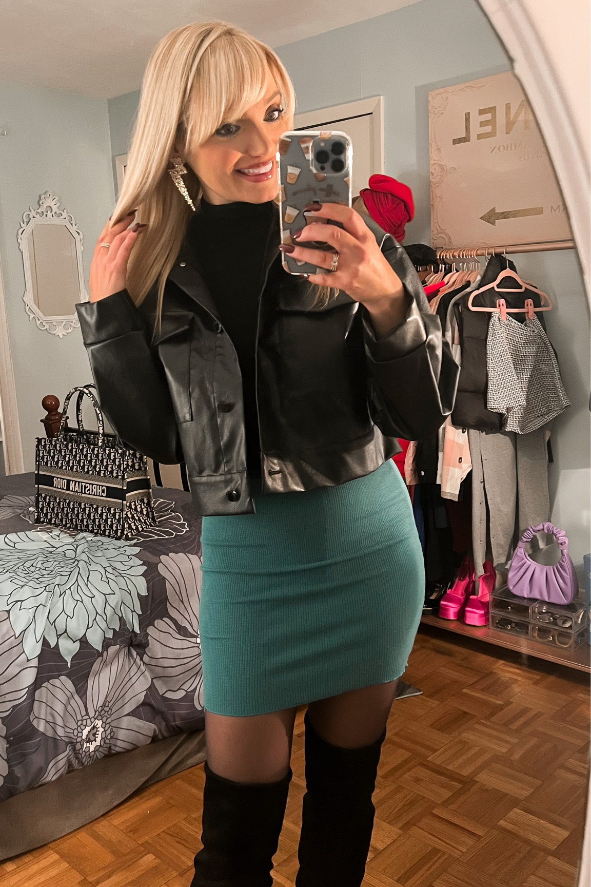 Winter date night look from Amazon Fashion - crop boxy moto jacket - crop mock neck top - Shein mini skirt - lightning statement earrings - over the knee boots - trendy outfit - Amazon favorites - Amazon Finds 

#LTKsalealert #LTKSeasonal #LTKunder50