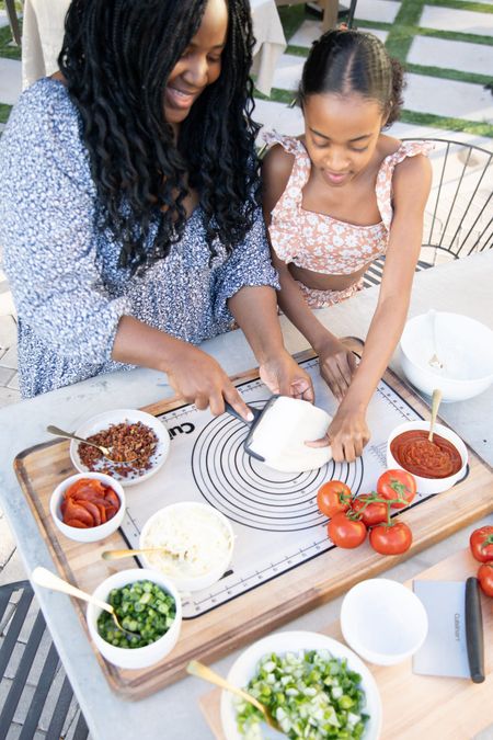 Family Outdoor Pizza Night Must Haves!

-working surface to make pizza 
-small and large bowls for toppings and sauces
-rolling pin
-best outdoor pizza oven ever