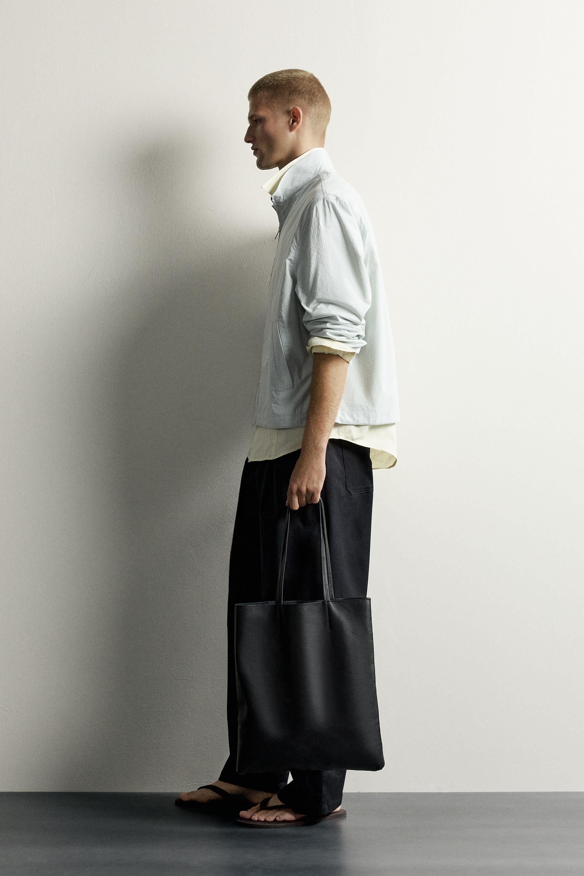 Relaxed fit jacket made from a cotton and lyocell blend fabric. Stand-up collar and long sleeves ... | Zara US
