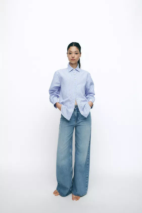 Collared, long-sleeved shirt. Front closure with buttons hidden by a placket and contrasting gold... | Zara US