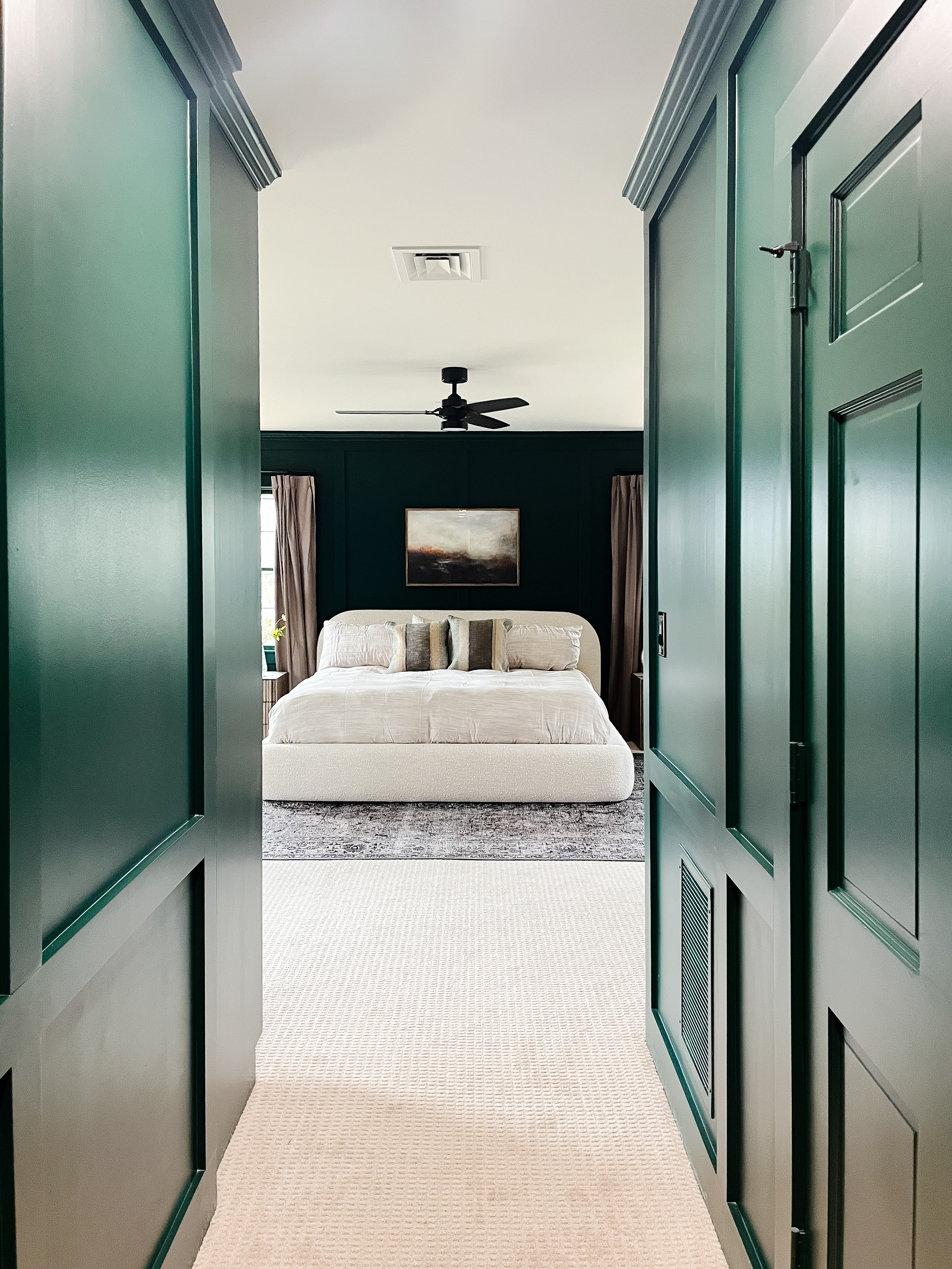 The perfect balance of depth and ease — bold walls, creamy neutrals, and timeless textures. Tap to shop pieces that capture this quietly luxurious midcentury-meets-modern bedroom look. 

 #LTKHome