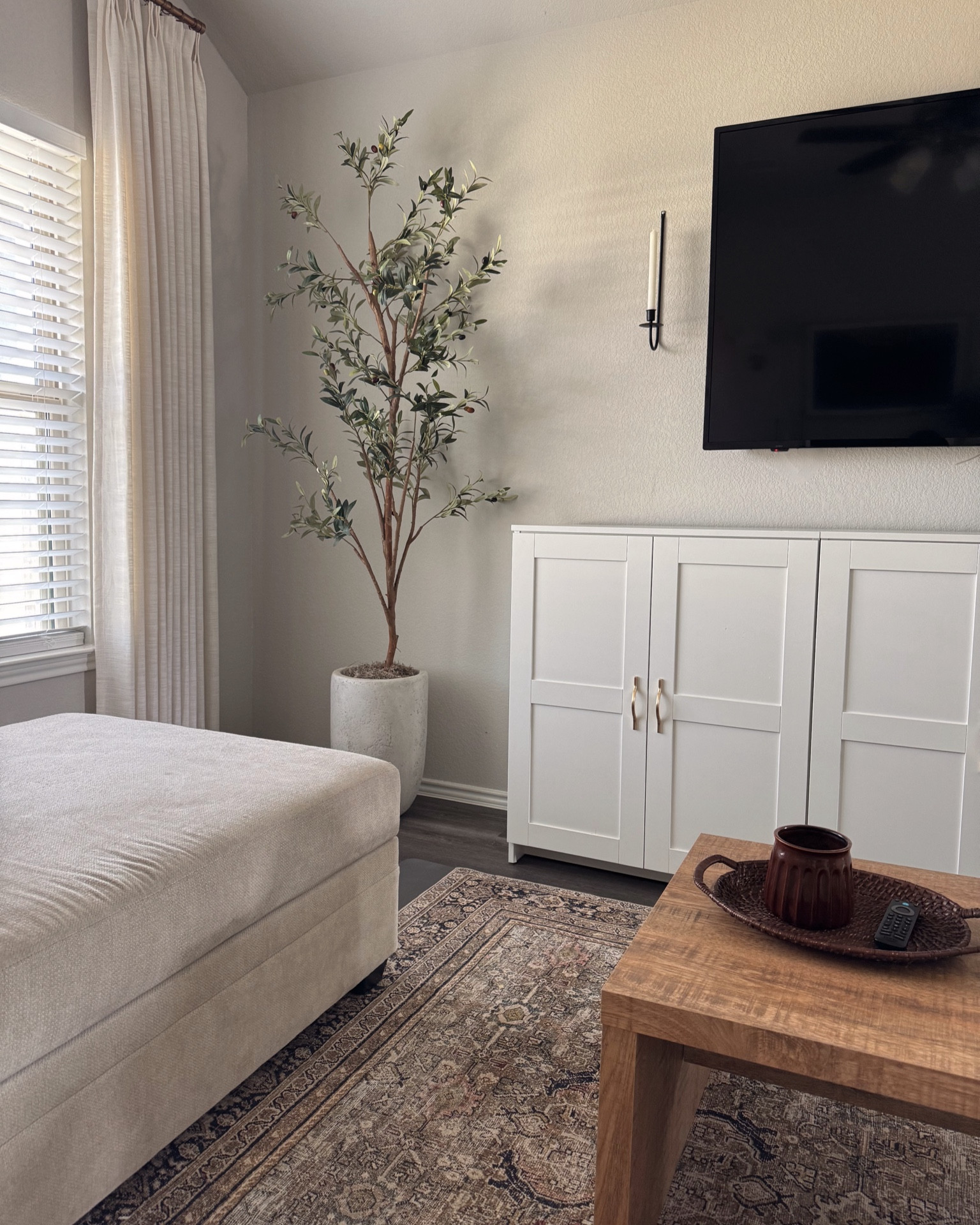 simple and clean for the new year! My tv console is from ikea. i pushed 3 brimnes cabinets together and changed the handles. my couch is from living spaces, the bonaterra sectional! 

#LTKHome #LTKFindsUnder50 #LTKFindsUnder100