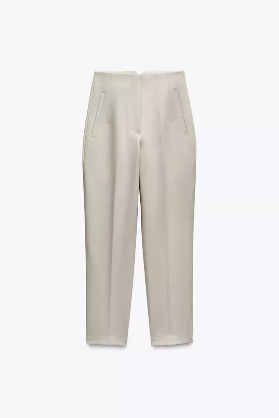 Pants with a high waist and pronounced seams at front and back. Front welt pockets. Front zip, me... | Zara US