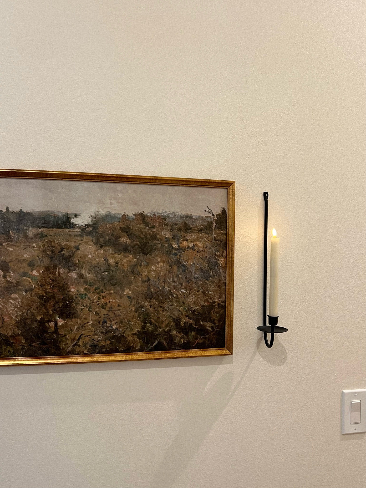 Affordable vintage inspired art! Amazon taper candles and cast iron wall sconces  

#LTKSeasonal #LTKFindsUnder50 #LTKHome