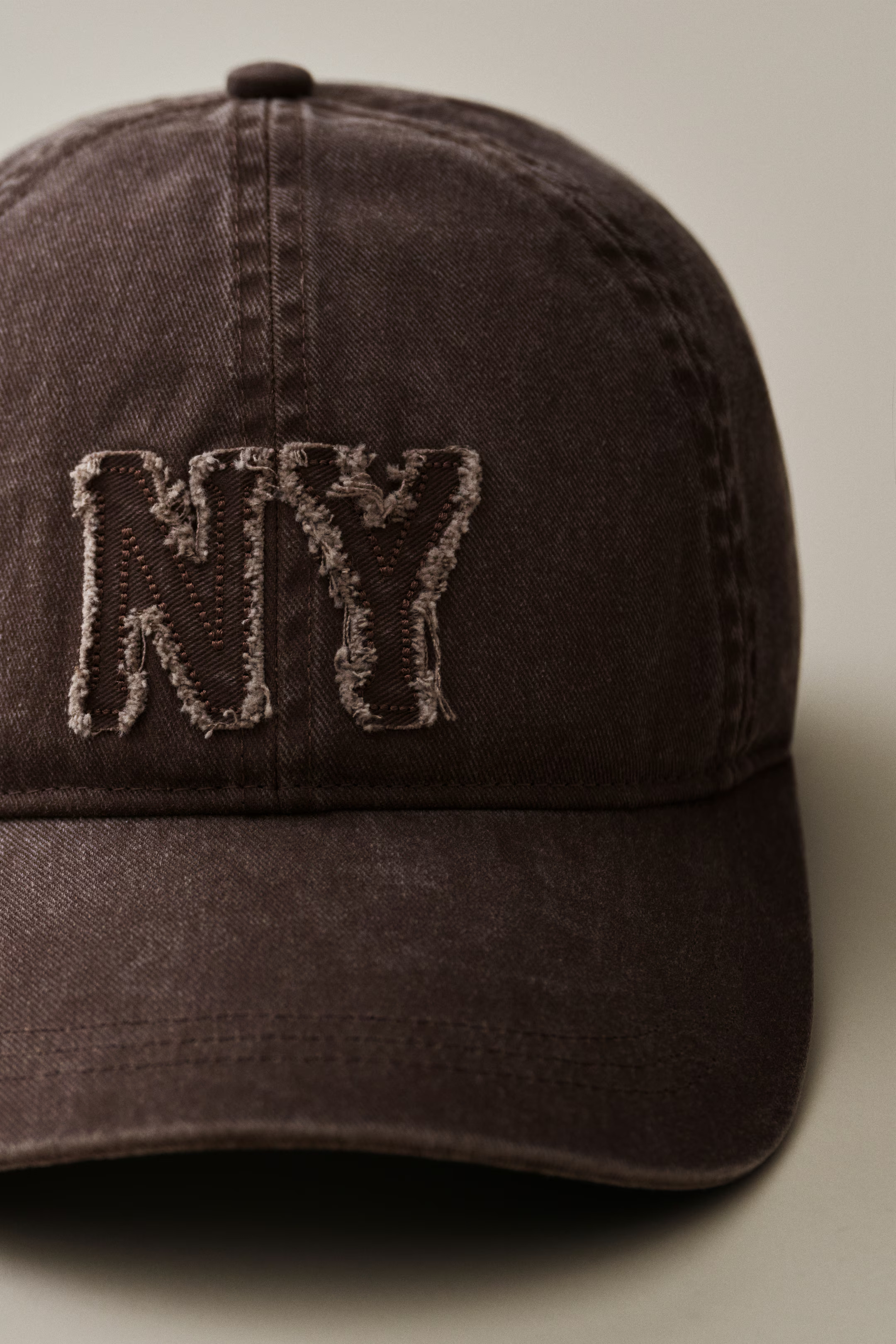 Appliquéd cotton cap | H&M (UK, MY, IN, SG, PH, TW, HK)