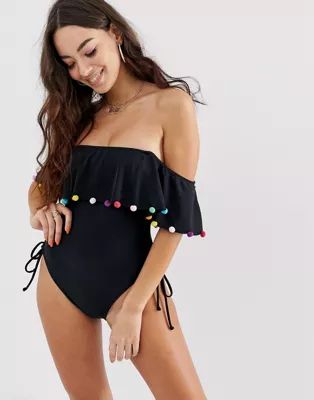 ASOS DESIGN pom pom frill off shoulder swimsuit with lace up detail in black | ASOS US