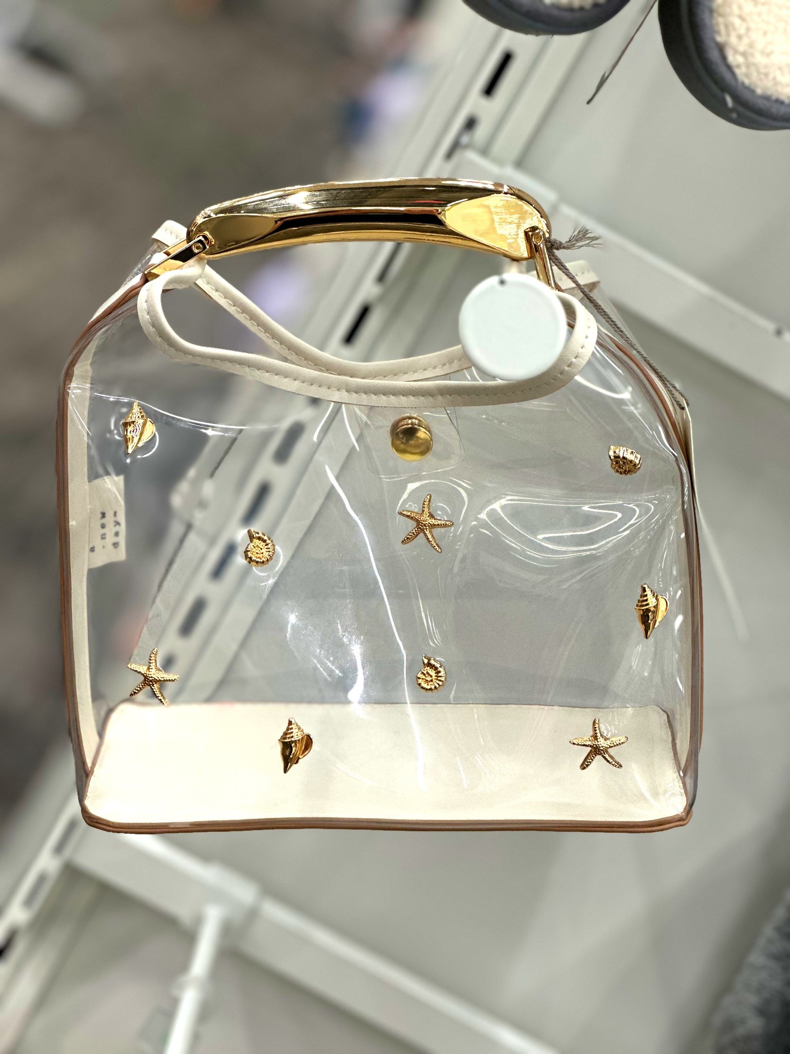 ✨ Ocean glam in every detail 🌊💫 This clear beauty, kissed with golden seashells, is your perfect summer statement piece.  Clear bag goals 🤌👜

#LTKSeasonal #LTKItBag #LTKStyleTip