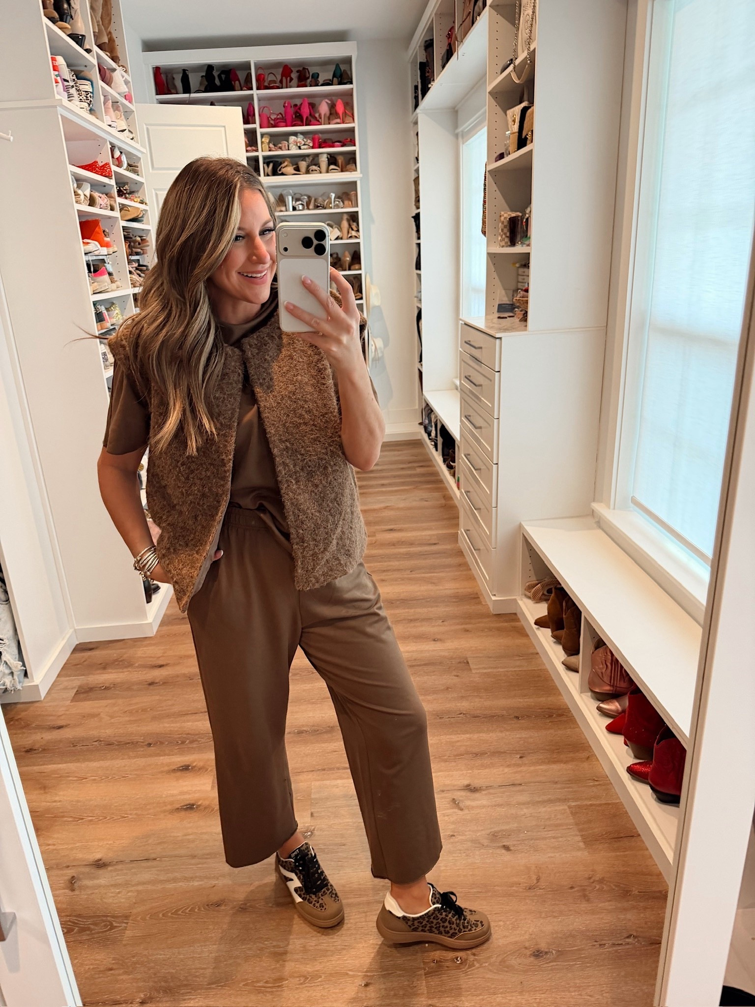 In a medium vest, medium 2 piece set, sneakers and accessories- fits tts.

#LTKStyleTip #LTKFindsUnder50 #LTKSeasonal