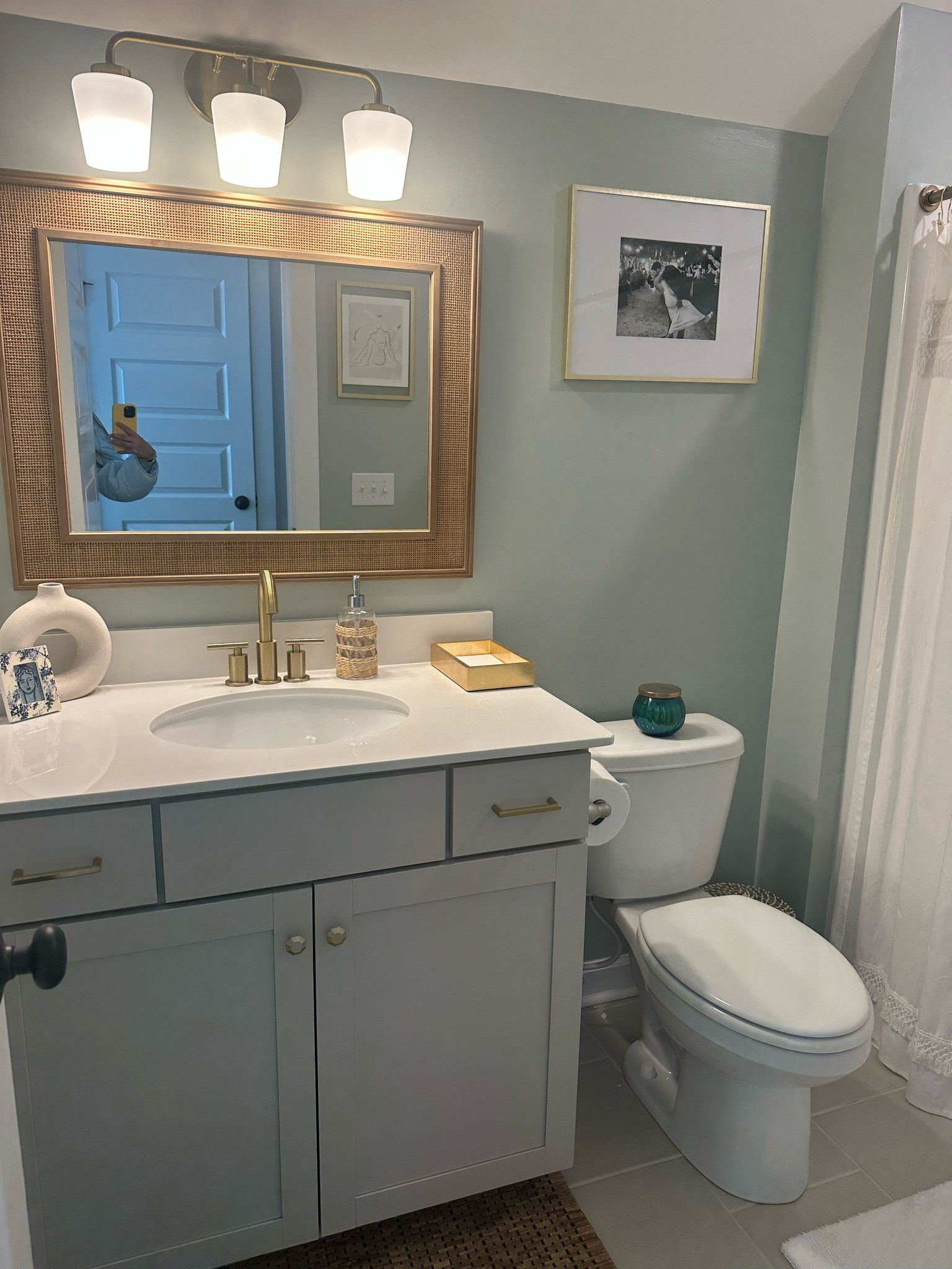 Custom color paint and mirror/fixture upgrades for our other guest bathroom. Loved adding color in here to brighten up the space! 

#LTKhome #LTKfindsunder100 #LTKU