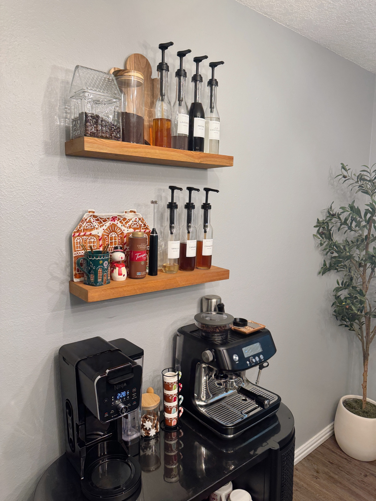 Our Christmas coffee bar! Went with gingerbread accents this year!!  ✨ Our exact cabinet is out of stock, but I linked some similar options! 

#LTKStyleTip #LTKHoliday #LTKSeasonal