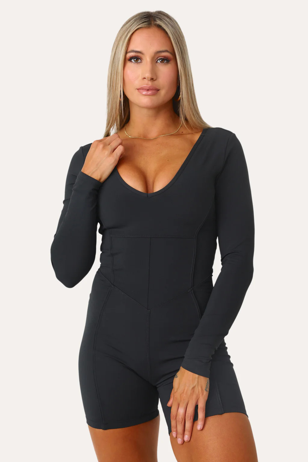 BACK IT UP BLACK LONG SLEEVE ACTIVE ONESIE | Kittenish