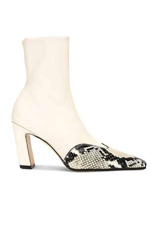 KHAITE Nevada Ankle Stretch Boot in Off White & Natural | FWRD | FWRD 