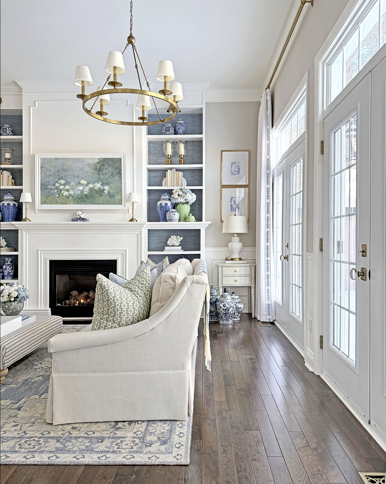 Our spring living room views with gorgeous florals, pillows, ginger jars and art in blue and green💙💚 

#LTKSeasonal #LTKHome