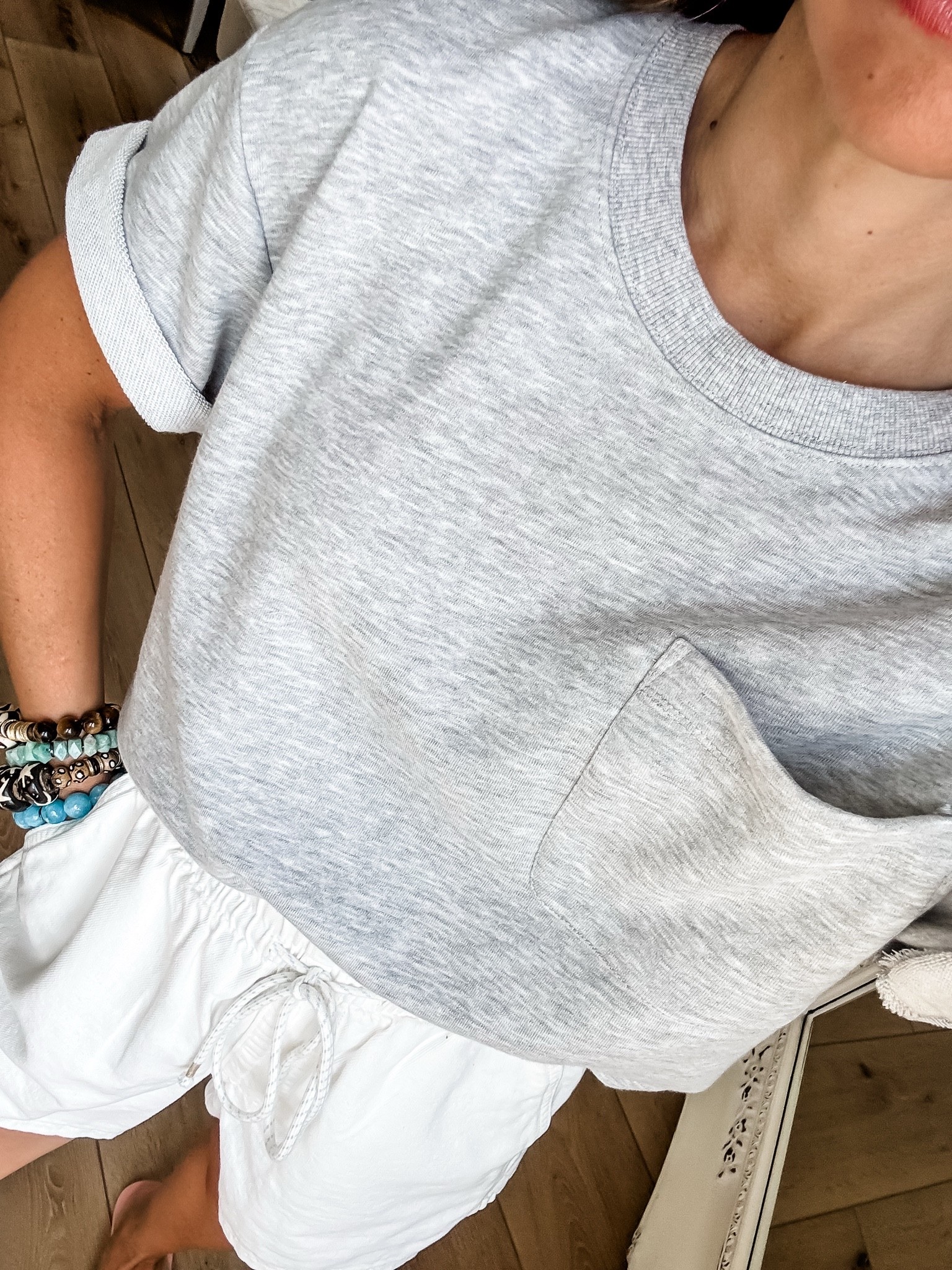 Small short sleeve sweatshirt. Small white shorts. Target style.

#LTKOver40