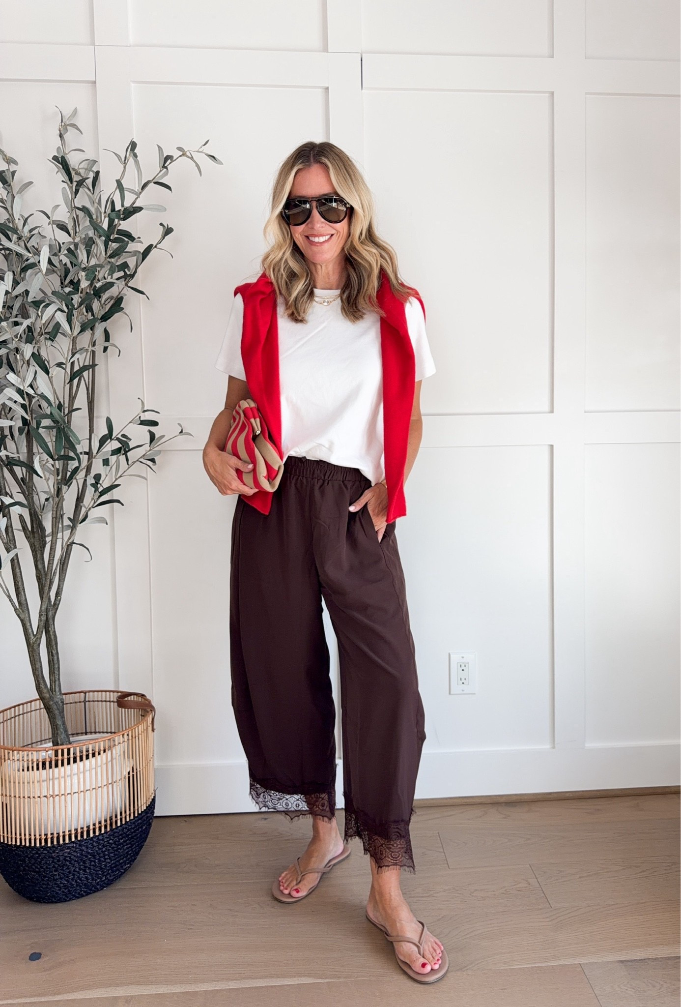 The lace trim on these chocolate brown pants is such a pretty detail, and I love them paired casually with a white tee and that pop of red. Comfortable, but still interesting enough to make a simple outfit feel special.

lace trim pants, chocolate brown pants, casual fall outfit, white tee outfit, red cardigan, transitional outfit, comfortable pants, fall fashion, casual style, everyday outfit, brown outfit, hauteandhumid

#LTKootd #LTKSeasonal #LTKTall