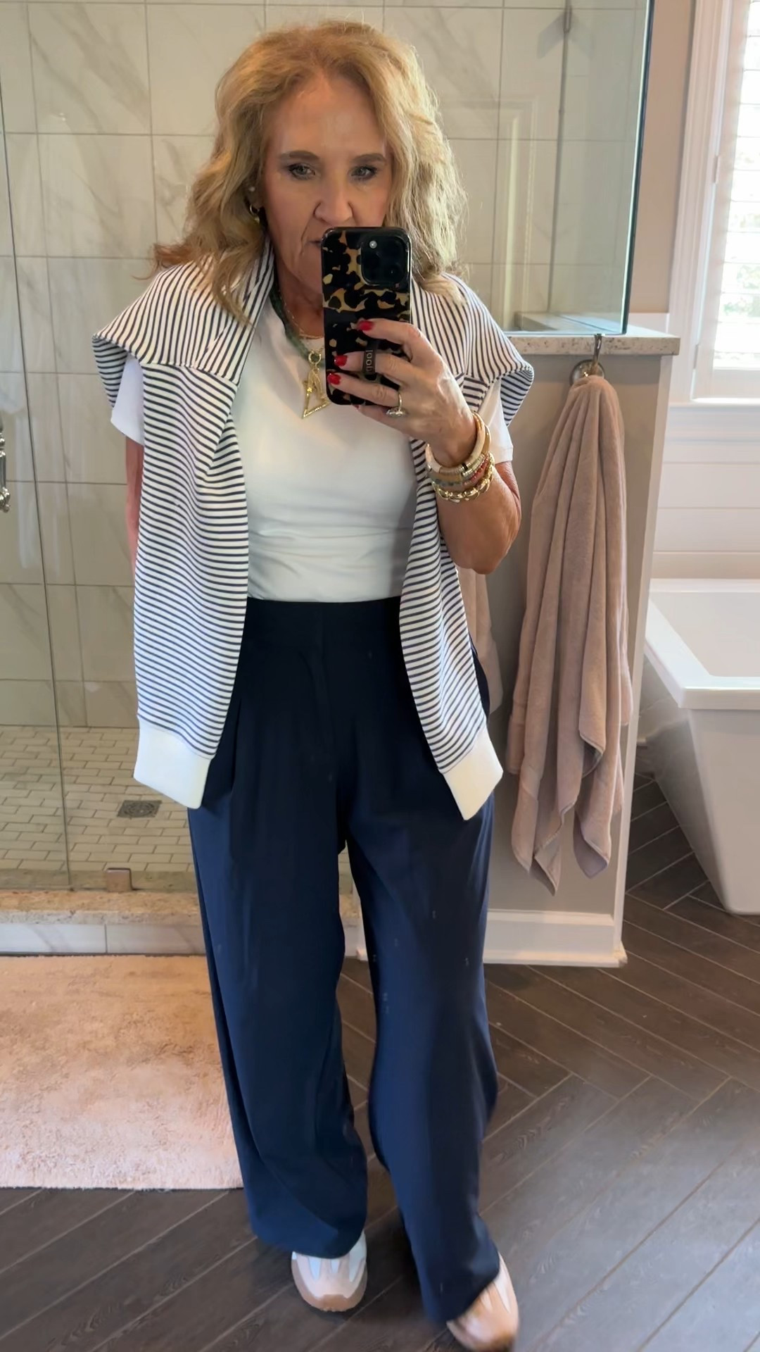 Athleta sale! 25% off. Love these trousers perfect travel pants 
Size 8 petite 
White tshirt size large 
Striped crew air essentials size medium spanx 15% off for new customers with code NANETTEXSPANX 
Love these sneakers! 

#LTKOver40 #LTKTravel #LTKWatchNow