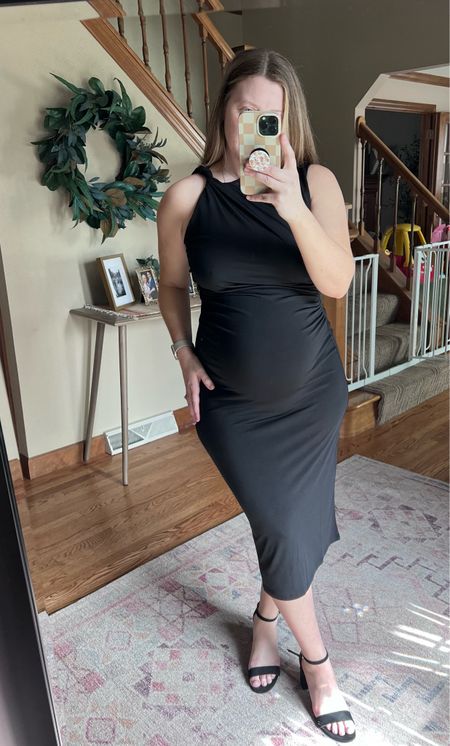 If you have a wedding or an event coming up this dress is IT! This is so flattering on a bump but honestly would be so good without! Love the ruched detail at the waistline and the neckline with the twisted strap feels so elevated! The material is pure stretch. Wearing a large- runs TTS! Selling fast! 

#LTKbump