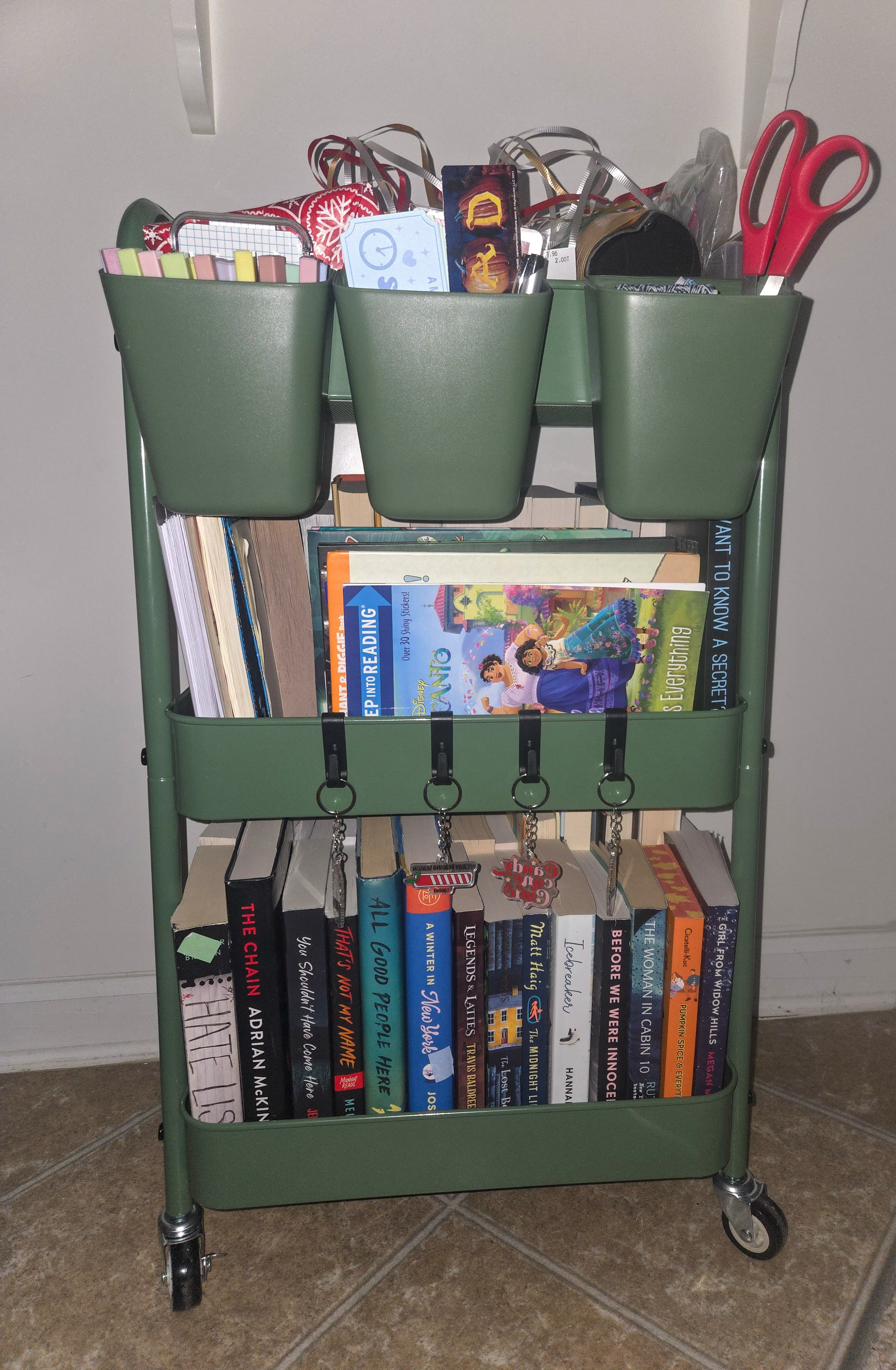 3 tiered rolling cart: comes with 4 hooks and 3 organizing bins.  Multiple colors on sale for under $40!  I am using mine to organize Blind Date With a Book supplies. 

#LTKCyberWeek #LTKGiftGuide #LTKHoliday