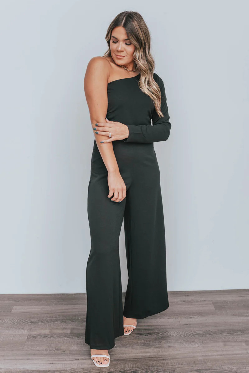 Let Your Heart Go Black One Shoulder Jumpsuit | Apricot Lane Boutique