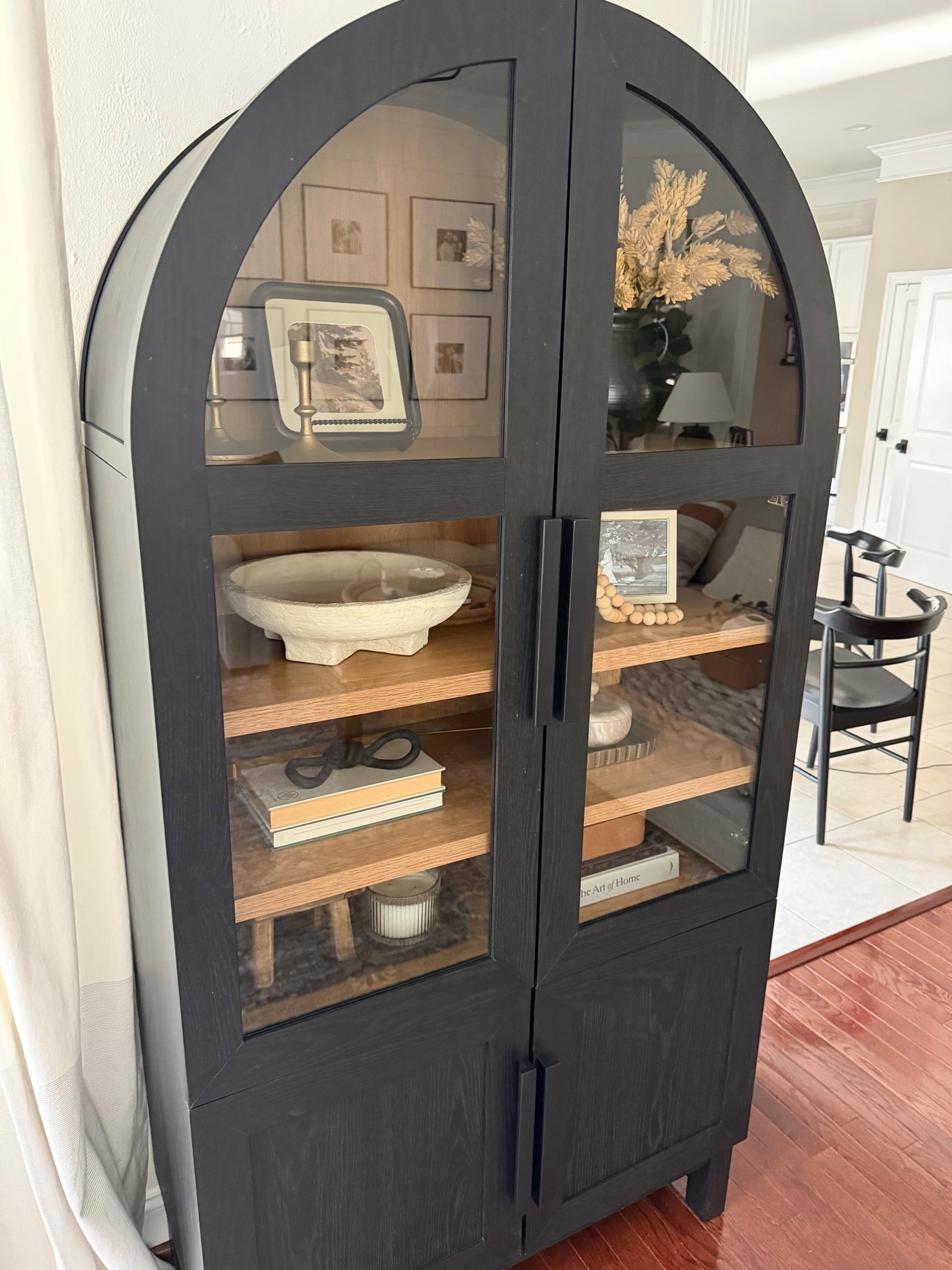 I’m loving the added storage to our family room with this gorgeous arch cabinet! The two toned wood is so beautiful in person. My favorite feature is probably the soft close hinges! For now I’m storing kids toys and puzzles in the bottom 🙌🏼 


Storage solutions / budget friendly cabinet / modern organic / neutral home decor / Viral Walmart Juliet arch cabinet / interior design  / shelf styling / black cabinet / family room 

#LTKmomlife #LTKHome #LTKSaleAlert