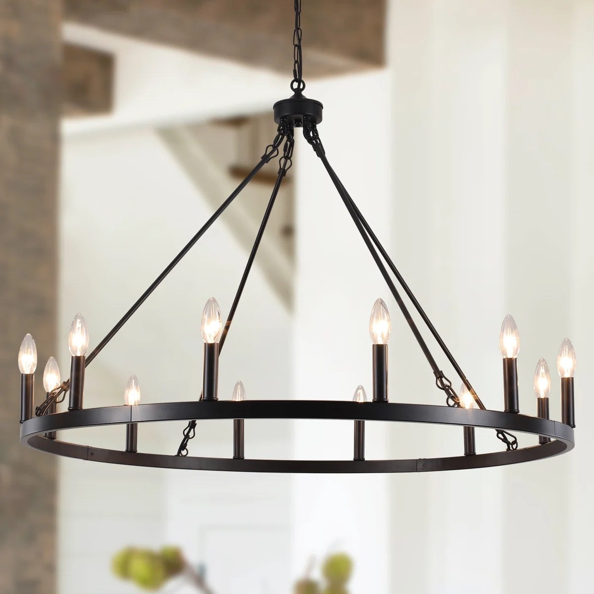 Inspired by farmhouse grand living, the Moomal 12-Light Wagon Wheel Chandelier brings bold character and warm illumination to large spaces. Its circular wagon wheel design paired with candle-style lights creates a striking centerpiece that feels both rustic and refined. ON SALE and under $250.

Keywords:

* wagon wheel chandelier
* farmhouse chandelier
* 12 light chandelier
* candle style chandelier
* dimmable chandelier
* rustic lighting fixture
* kitchen island lighting
* dining room chandelier
* foyer chandelier
* modern farmhouse lighting
* large chandelier
* statement lighting
* rustic home décor
* open concept lighting
* industrial farmhouse chandelier
* ceiling lighting fixture
* warm ambient lighting
* country style lighting
* elegant rustic décor
* oversized chandelier

#LTKSaleAlert #LTKHome #LTKSeasonal
