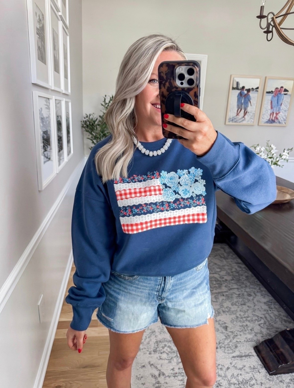Trending! This patriotic sweatshirt is too cute for Memorial Day and the Fourth of July 🇺🇸 I love the floral flag detail mixed with the denim shorts for an easy casual look you can wear all summer long. Lightweight enough for cool nights, lake days, fireworks, and weekend plans.

patriotic sweatshirt, fourth of july outfit, memorial day outfit, usa sweatshirt, casual summer outfit, denim shorts outfit, patriotic style, cute holiday outfit, american flag sweatshirt, summer graphic sweatshirt, comfy casual fashion, red white and blue outfit, lovelylifestyling

#LTKSeasonal #LTKTravel #LTKOver40