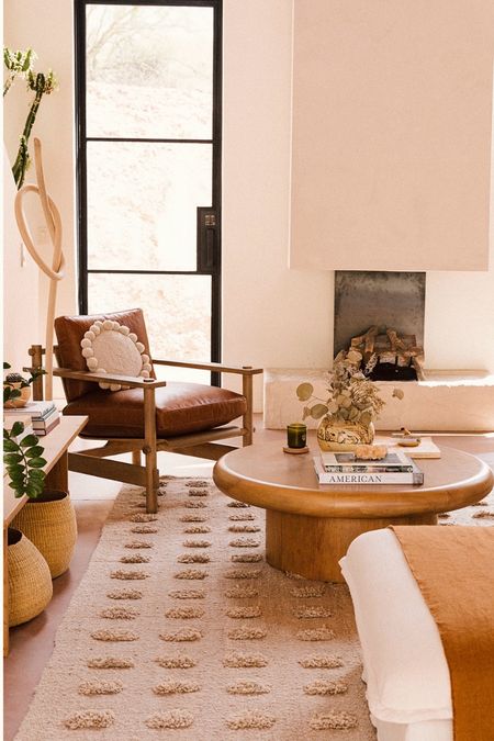 Neutral and earthy living room 

I love a round coffee table with a sectional and also for smaller spaces. It makes moving freely around the room so easy. 

Linking a few similar ones too  

#LTKhome