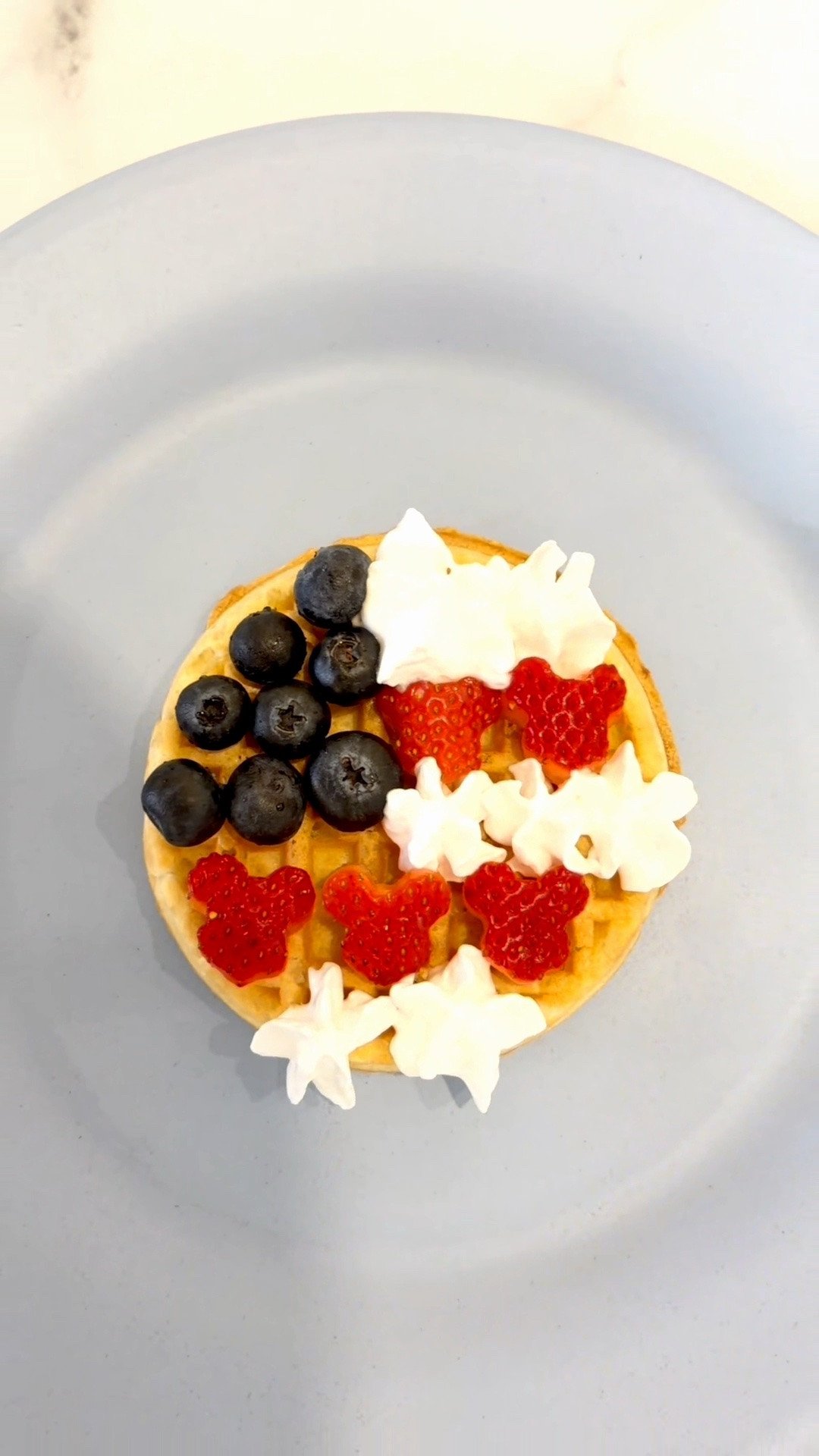 A little Disney magic for the 4th of July with waffles, blueberries, Mickey strawberries, and whipped cream 🇺🇸✨ I used my mini Mickey shaped cookie cutter to get the strawberries Mickey shaped 🐭

#LTKSeasonal #LTKmomlife #LTKHome