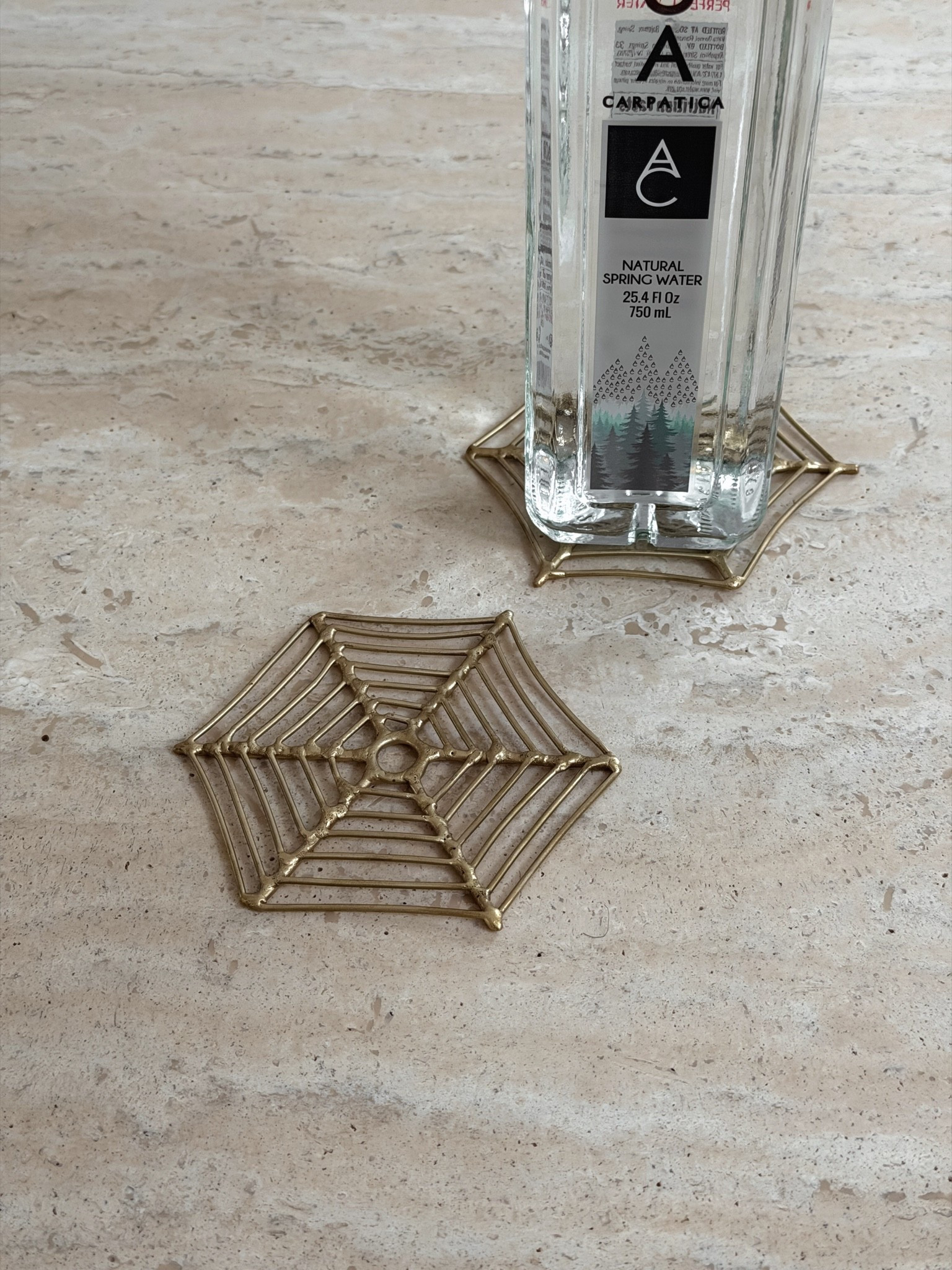 My spiderweb coaster set from Anthropologie is back 🕸️ available on both Anthropologie and Terrains website

#LTKHome