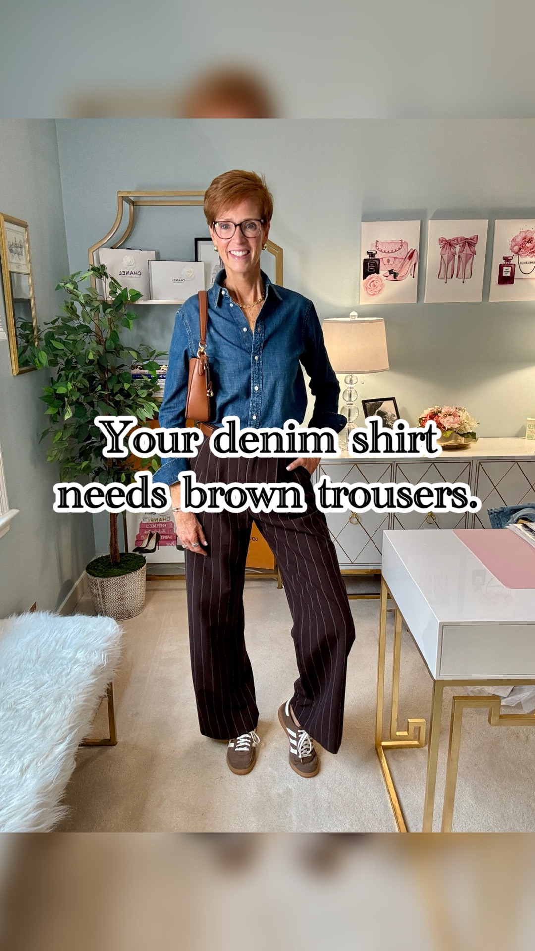 Denim and brown might be one of my favorite combinations heading into fall.

For Pinterest Inspired Outfit #29, I paired a classic denim shirt with brown trousers, a brown leather belt, brown bag and brown suede sneakers. Keeping the accessories in the same color family makes the outfit feel pulled together without making it feel overly styled.
And this is exactly why I keep coming back to a denim shirt: it works almost like a neutral. With brown trousers instead of jeans, it feels a little more polished while still being easy enough for everyday wear.

Save this denim shirt outfit idea for fall, and send it to someone who is always looking for another way to wear a denim shirt.

#LTKootd #LTKOver40 #LTKTall