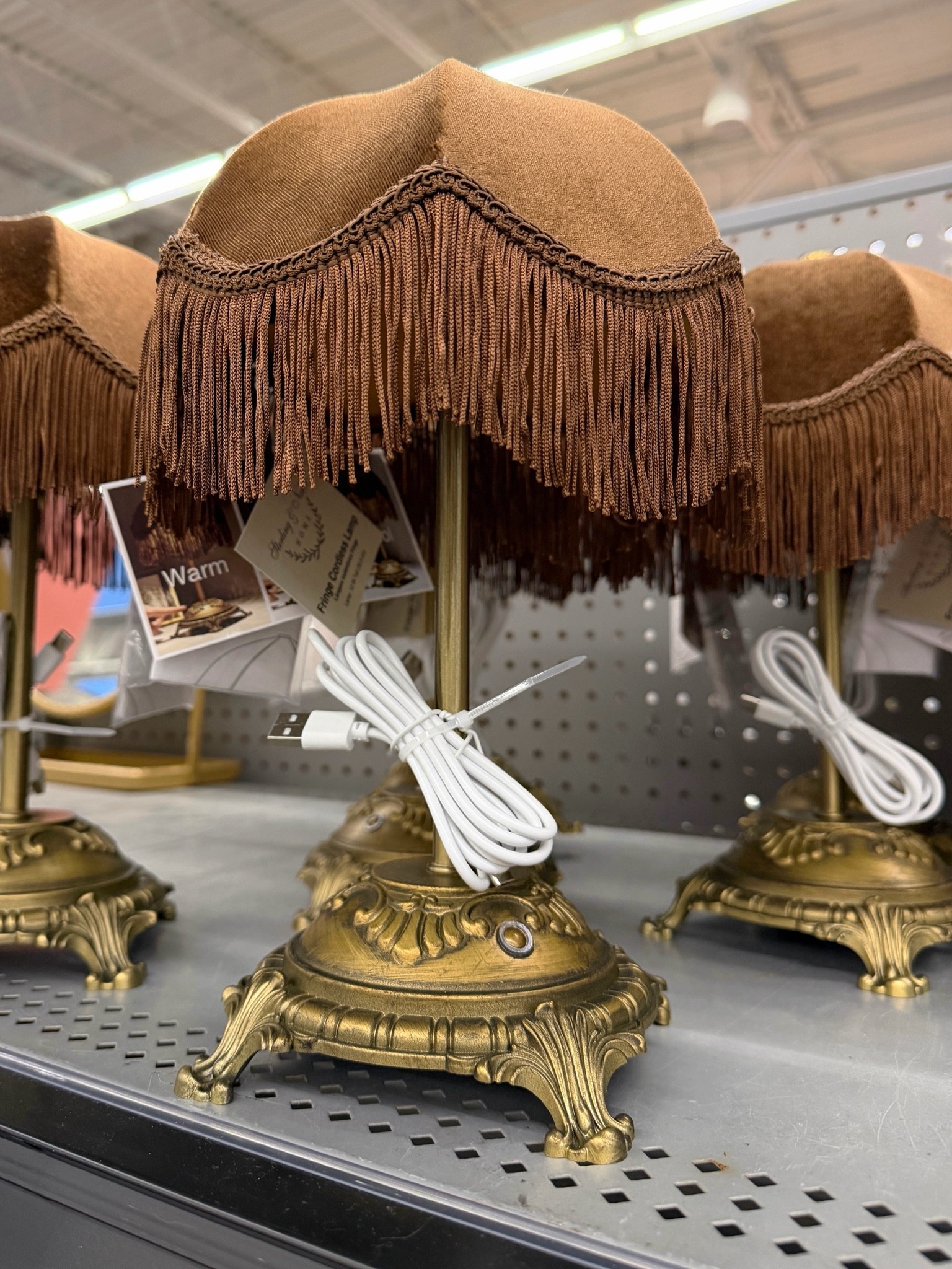 Spotted this vintage-inspired table lamp on my latest Walmart run and had to share! 🤎✨ The fringe shade is such a fun detail and gives it that charming antique-inspired look that feels perfect for cozy fall decorating. 🍂 Such an affordable little find for adding warmth and personality to a nightstand, console, or side table! 💫 @Walmart #tablelamp #lamp #vintagedecor