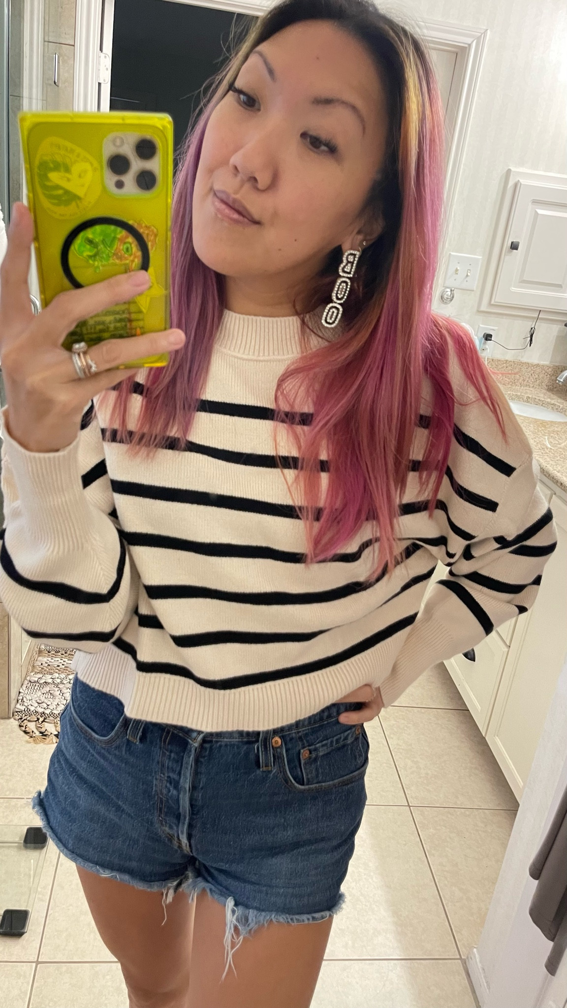 Keep wearing sweaters and you’ll manifest fall weather in no time! This is the perfect weather to wear in between summer and fall because it is light colored, and looks cute with shorts or high waisted pants going into the fall transition season. I love this sweater in the black and off-white ivory cream combo, the boxy fit is cropped, but not too short. The classic black and white stripes go with so much, timeless!

#LTKSeasonal #LTKFind #LTKstyletip