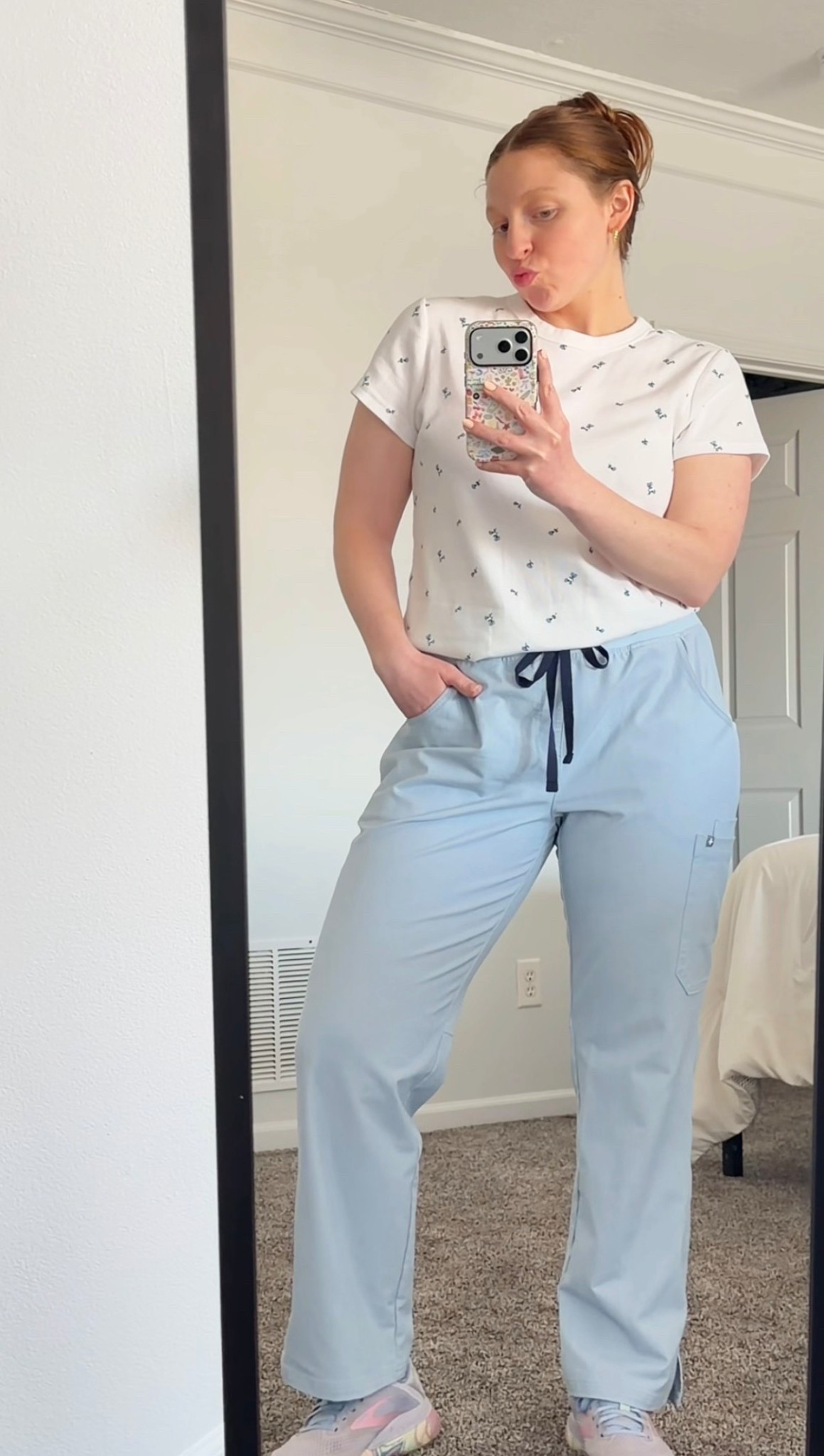old navy printed tee (size xl) styled as a scrub top alternative paired with figs kade cargo scrub pants (size l, chambray)

love this soft blue + white scrub combo for a clean, elevated healthcare outfit — comfy, flattering, and still practical for long shifts

scrub outfits | figs scrubs | old navy basics | healthcare workwear | scrub style | nurse outfits | ot outfits | comfy work outfits | occupational therapy 

#LTKdayinmylife #LTKootd #LTKgrwm