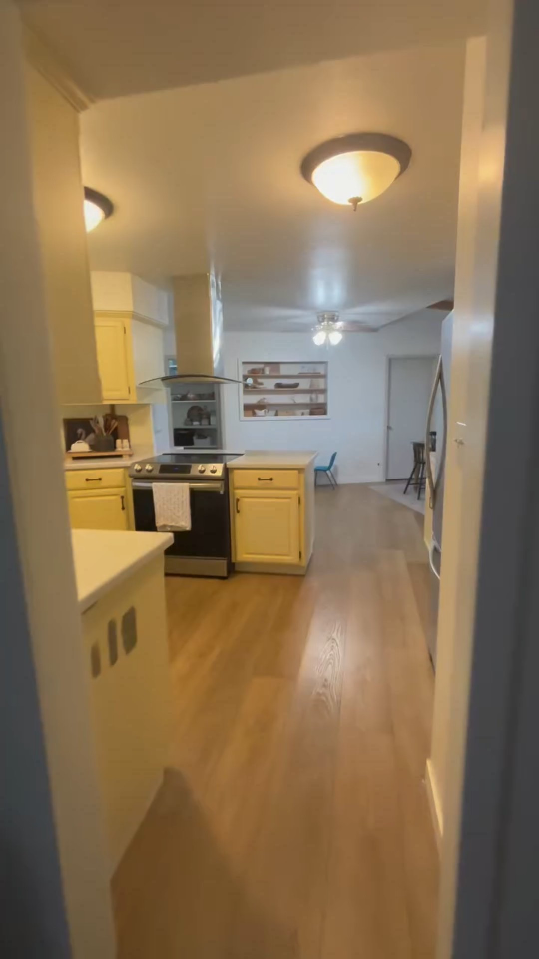 I am obsessed with how phase one of my kitchen makeover turned out😍 I painted the cabinets in the color Sage from @beyondpaintdiy , added new handles and knobs, and my wonderful husband updated the light fixtures and plug ins for me! Phase two will be backsplash, new hood vent and a new faucet but that will be in the spring 🌷 
In the before , the cabinets are bright yellow, the walls were a light yellow, and all the light bulbs were VERY yellow 😵‍💫 this Sage is the perfect green, not too dark, not too light, and adds such a cozy and inviting feel to the kitchen. 
I used this paint on my bathroom cabinets (check out that reel on my page if you want more details) and it has held up perfectly so far! I even tried to scratch one to see if any paint would come off before I committed to using it in my kitchen, and it didn’t leave a mark. I am confident that my kitchen cabinets will hold up as well😍
Comment PAINT and I’ll send you the link so you can check it out! 
#beyondpaint #ad #beforeandafter #kitchenmakeovers