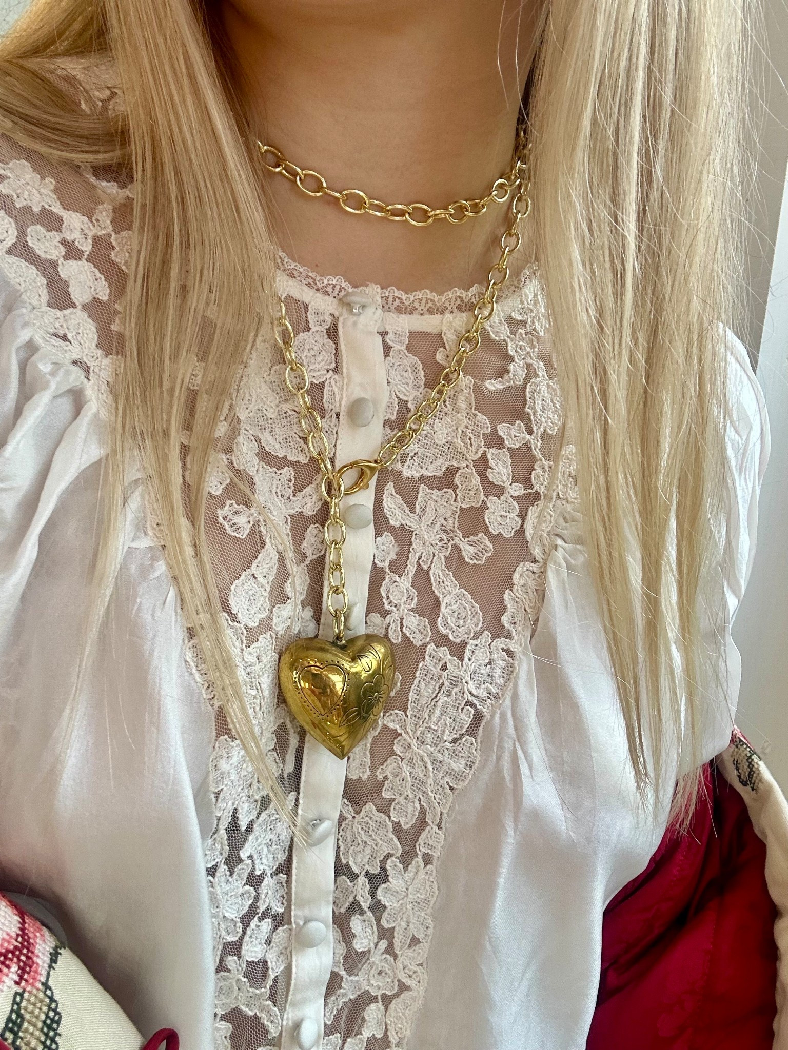 New silk blouse from LoveShackFancy✨

The splurge is worth it for the quality and details with this one. 100% silk, beautiful lace detailing, made in India. I’m wearing an xxs it does run oversized! 
( necklace shellsandroses.com)

#falloutfit #holiday #blouse #top #silk #work #dinner #vintageinspired 
