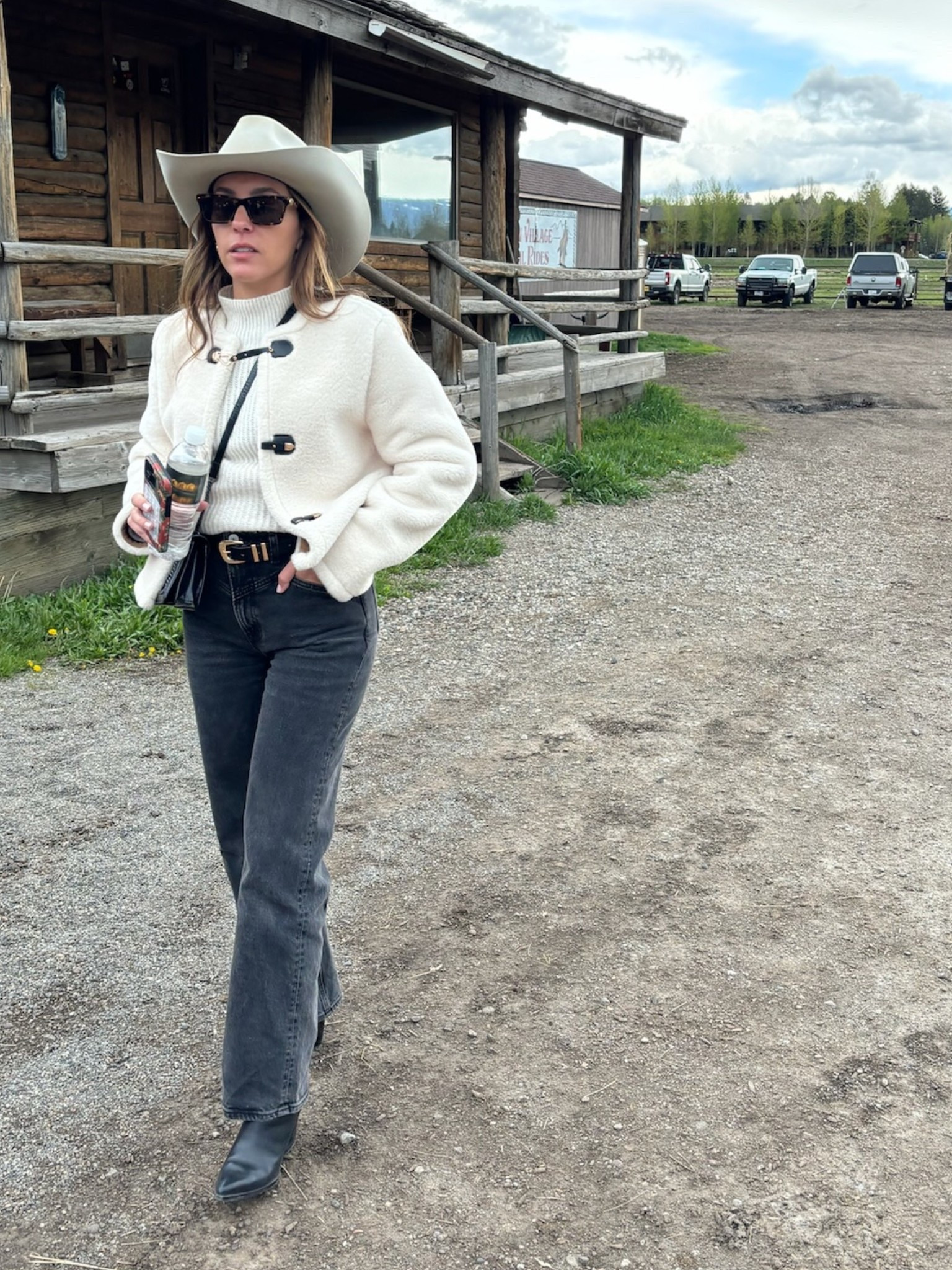 Post-trail coffee hits different in Jackson Hole 🤠✨ After a morning on horseback, I threw on this cozy toggle jacket, my favorite flared denim, and a statement belt to keep it classic cowboy but city-girl ready. Tap to shop the exact pieces that made this look ride-or-die. 

#JacksonHoleStyle #LTKWestern #RanchToRunway #CowgirlCore #LTKOutfit #RodeoReady #WesternFashion #CowgirlStyle

#LTKTravel #LTKStyleTip
