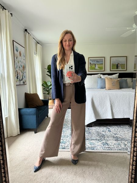 What I wore to work. Wide leg pants with collared v-neck tee and navy sweater blazer

Pants are made out of a lightweight crepe material that’s really breathable! Definitely will wear them into summer. Fit true to size 

Got my normal size in the tee and sized down in the blazer (out of stock but linked similar options)

#LTKworkwear #LTKstyletip #LTKfindsunder100
