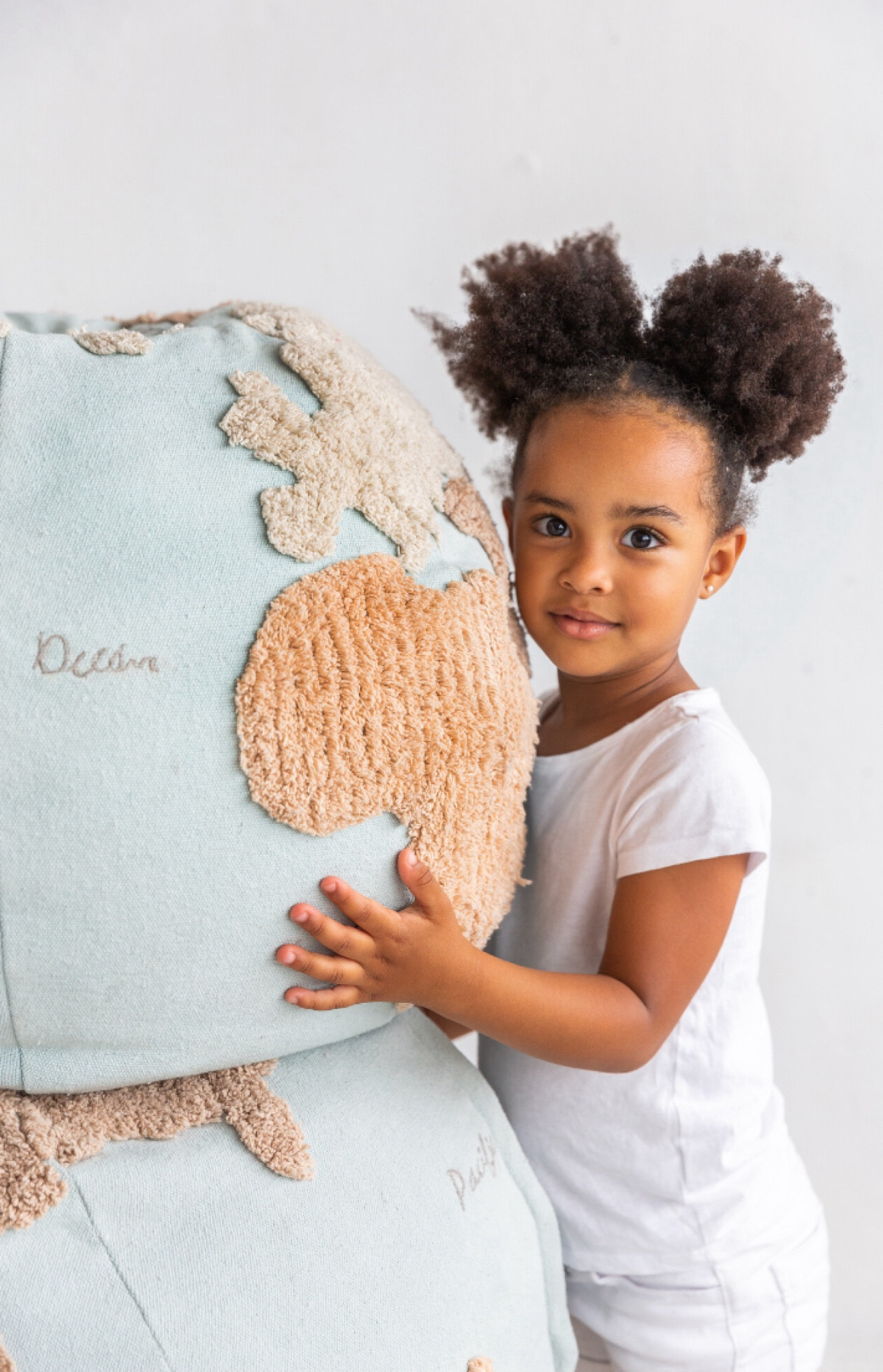 Round pouf simulating the planet Earth, with the continents tufted in soft rug pile in natural, beige and linen colors on top of a light blue canvas base. Names of oceans and continents in grey embroidery. Finished with a zipper, which allows to remove the filler. The filler is made of a mix of fibre from recycled PET-bottles, and light-weight polystyrene pearls. Toddler playroom kids furniture cute

#LTKHome #LTKKids #LTKBaby