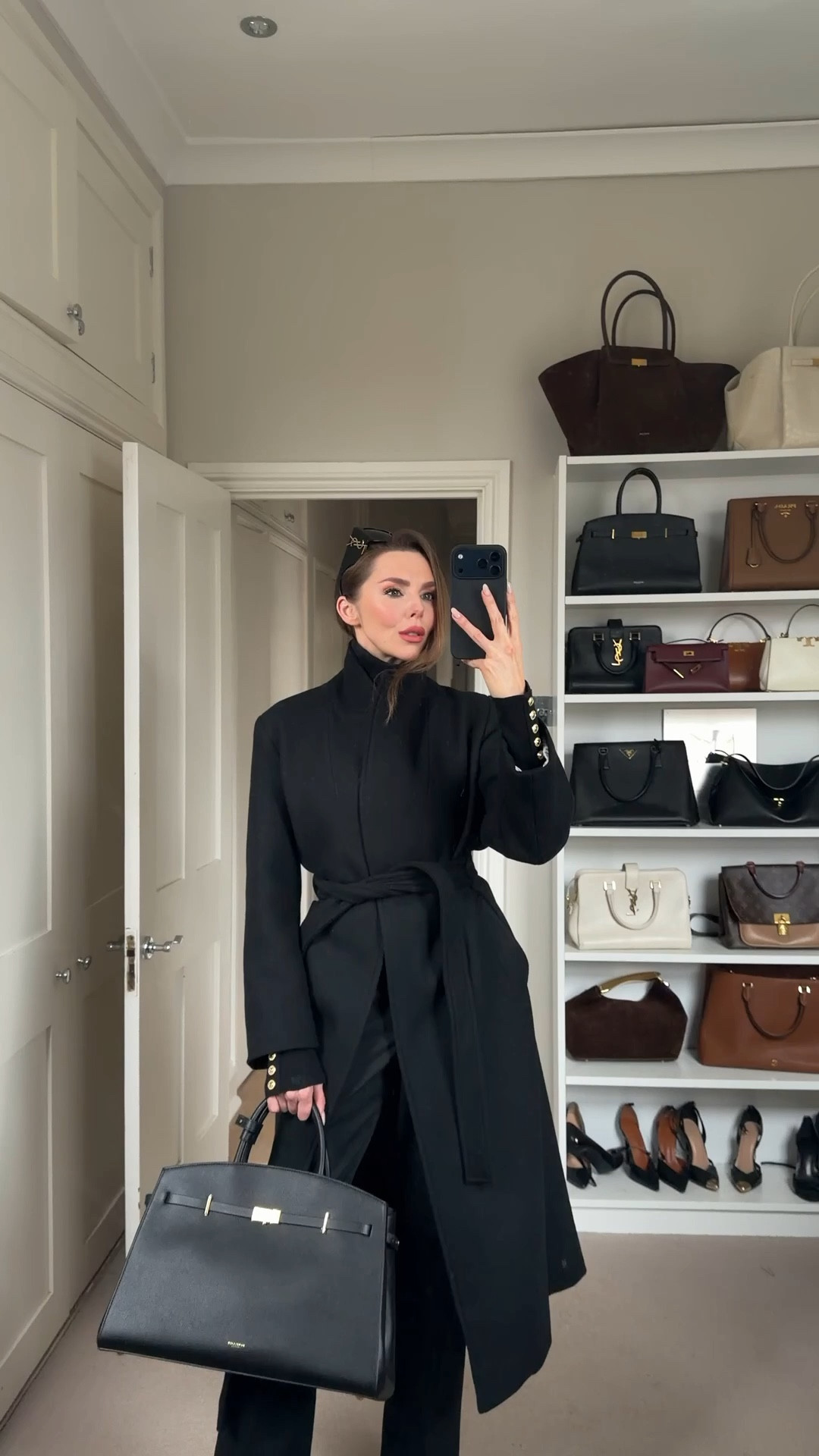 Effortless power dressing in all black 🖤

Wearing a black wool belted coat with a tailored silhouette, styled over a black cashmere roll neck with chic gold button sleeve detailing. Paired with black tailored trousers / suit trousers for that sharp, elongated fit and finished with pointed toe black ankle boots with a sleek stiletto heel.

Accessories are everything… an oversized black YSL sunglasses moment and a structured black tote bag with gold hardware that fits your laptop perfectly.

Timeless. Smart. Elevated everyday luxury.

#BlackCoat #WoolCoat #TailoredTrousers #CashmereRollNeck #AnkleBoots #StilettoHeel #WorkwearStyle #MinimalChic #LuxuryStyle #OfficeOutfit #AllBlackOutfit

#LTKuk #LTKworkwear #LTKluxury