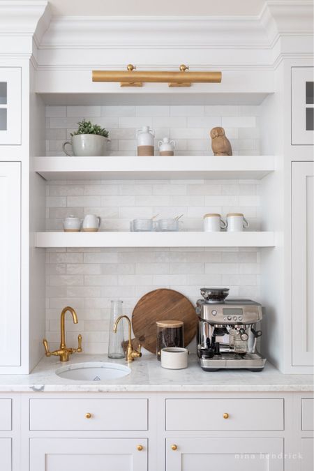 Here’s a sneak peek at our new kitchen! This coffee bar area is something I knew I needed to have. I can’t get enough of all of the features — from my beloved Breville espresso machine to an instant hot water faucet for making americanos. Get all of the sources below! 

#LTKhome